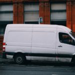 a white van parked on the side of the road